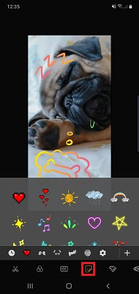 Tap the sticker icon to add stickers to your video