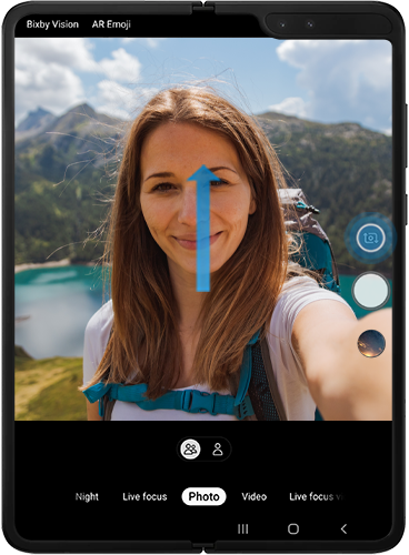 Swipe up or tap the swap camera icon to use the rear cameras