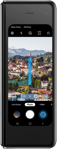 Swipe up or tap the swap camera icon to change to the front facing camera