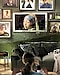 A woman watches The Frame as it displays the Girl with a Pearl Earring painting, which is surrounded by other art pieces.
