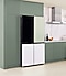 A Bespoke refrigerator with green, black, and white panels is in a kitchen with green walls and grey tiles. A Bespoke refrigerator with green, black, and white panels is in a kitchen with green walls and grey tiles.