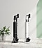 Two Bespoke Jet AI vacuums are in a room. The black Bespoke Jet AI vacuum is on the right next to a plant and the misty white Bespoke Jet AI vacuum is on the right. Two Bespoke Jet AI vacuums are in a room. The black Bespoke Jet AI vacuum is on the right next to a plant and the misty white Bespoke Jet AI vacuum is on the right.