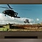Q800T Soundbar is seen on wood cabinets, with a TV mounted on a wall. The helicopter is on the TV screen.