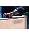 As someone is putting a smartphone with NFC on top of TV, The Serif is showing that the song 'Over the Horizon' is now playing. It is showing that how to connect phone to TV with Samsung The Serif NFC.