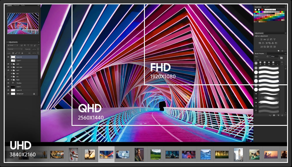 Monitor screen displays video editing software, with video frames along the bottom, and editing tools on the right side of the screen. In the center of the screen, the focus of the editing shows a pathway illuminated in bright pink and purple colors. It is overlaid with three white squares showing the specifications of the three resolution options available for the monitor, UHD (3840x2160), QHD (2560x1440) and FHD (1920x1080).