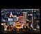 A city lit up by bright lights is on display. The colors and lights are vivid as OLED lights portray through the screen.