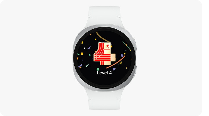 Galaxy Watch8 con la funzionalità Allenatore per la corsa sullo schermo, che mostra il livello di corsa con l’icona del numero 4 e il testo Livello 4. Sullo schermo ci sono anche dei coriandoli, a indicare che l’utente ha completato con successo la prova del livello di corsa.