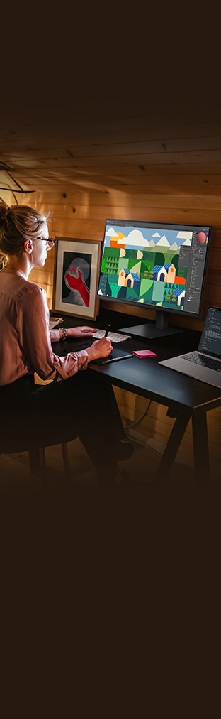 Una persona sta modificando un’immagine con un monitor ViewFinity high resolution.