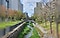 光学3倍で撮影したビル群を流れる川の写真。