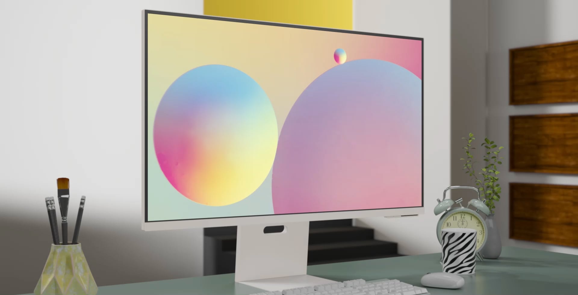 На столе установлен тонкий белый монитор. Затем монитор начинает вращаться, меняя свой цвет и задний фон: с белого на зеленый, с зеленого на голубой и с голубого на розовый. Четыре монитора взяты в рамку и обращены тыльной стороной к зрителю, демонстрируя красочный дизайн. Сцена меняется еще раз, представляя монитор с разноцветной заставкой.