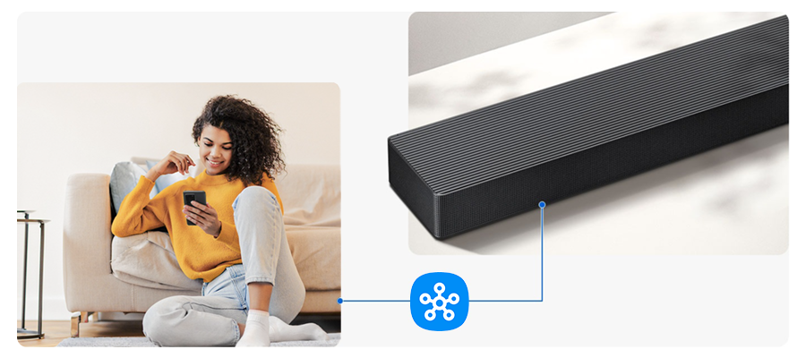 Девушка управляет саундбаром через смартфон с помощью SmartThings