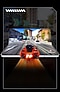 A Galaxy Z Fold5 is partially folded and viewed from the front. The screen displays an in-game scene of a racing game, depicting a red sports car dashing through the city.