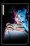 A woman is playing a game on her Galaxy S23 Ultra with a gaming headset on. The background is dark while her face and the Galaxy S23 Ultra in her hands are brightly lit with neon lights.