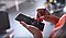 An over-the-shoulder shot of someone scheduling tasks on a Galaxy Note10 to master time management