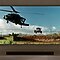 Q800T Soundbar is seen on wood cabinets, with a TV mounted on a wall. The helicopter is on the TV screen.