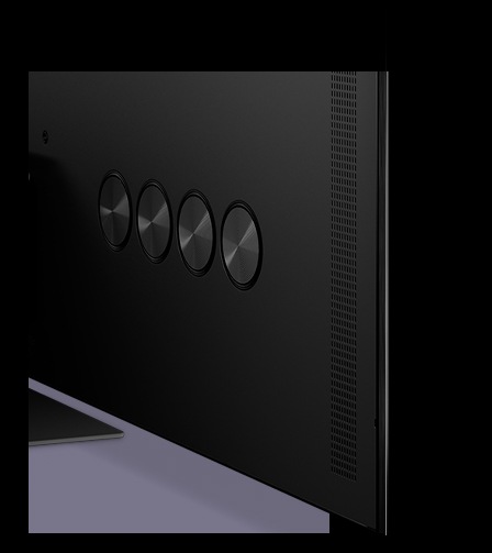 Quatre enceintes rondes intégrées à l’arrière du téléviseur Samsung OLED 2024 créent une apparence harmonieuse.