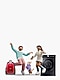 A stylish man and woman, appearing as a couple, are seen from the front holding hands and waltzing to music. Behind them, The Frame Pro is mounted on the wall, displaying a colorful screensaver. Below it, the Music Frame is placed, playing music, with several blue musical note icons floating between the characters and the products.
