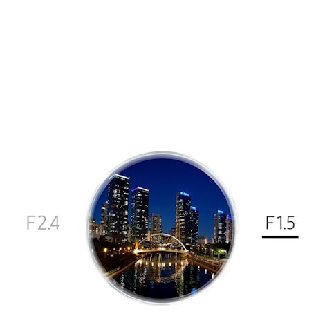 Фотографија на небото снимена со Galaxy S10+, но овој пат навечер, со осветлените згради наспроти ноќното небо.