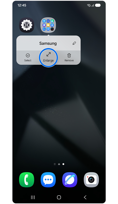 Home screen with a folder settings pop-up menu from an app folder with ‘Enlarge’ highlighted.