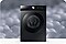 Samsung washing machine seen from the front with laundry inside. Behind it is a close-up of bubble texture.