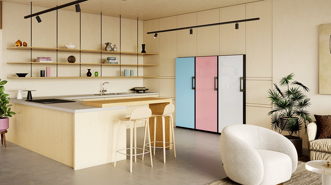 Three 1-door Bespoke refrigerators with each handles on the right side are in a row in a modern kitchen. From left to right, their panel colors are Satin Sky Blue, Glam Pink, and Glam White.
