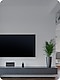 Living room with TV on wall