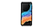 The ruggedized Galaxy XCover6 Pro smartphone standing with the screen facing the camera in front of a half-built concrete room.