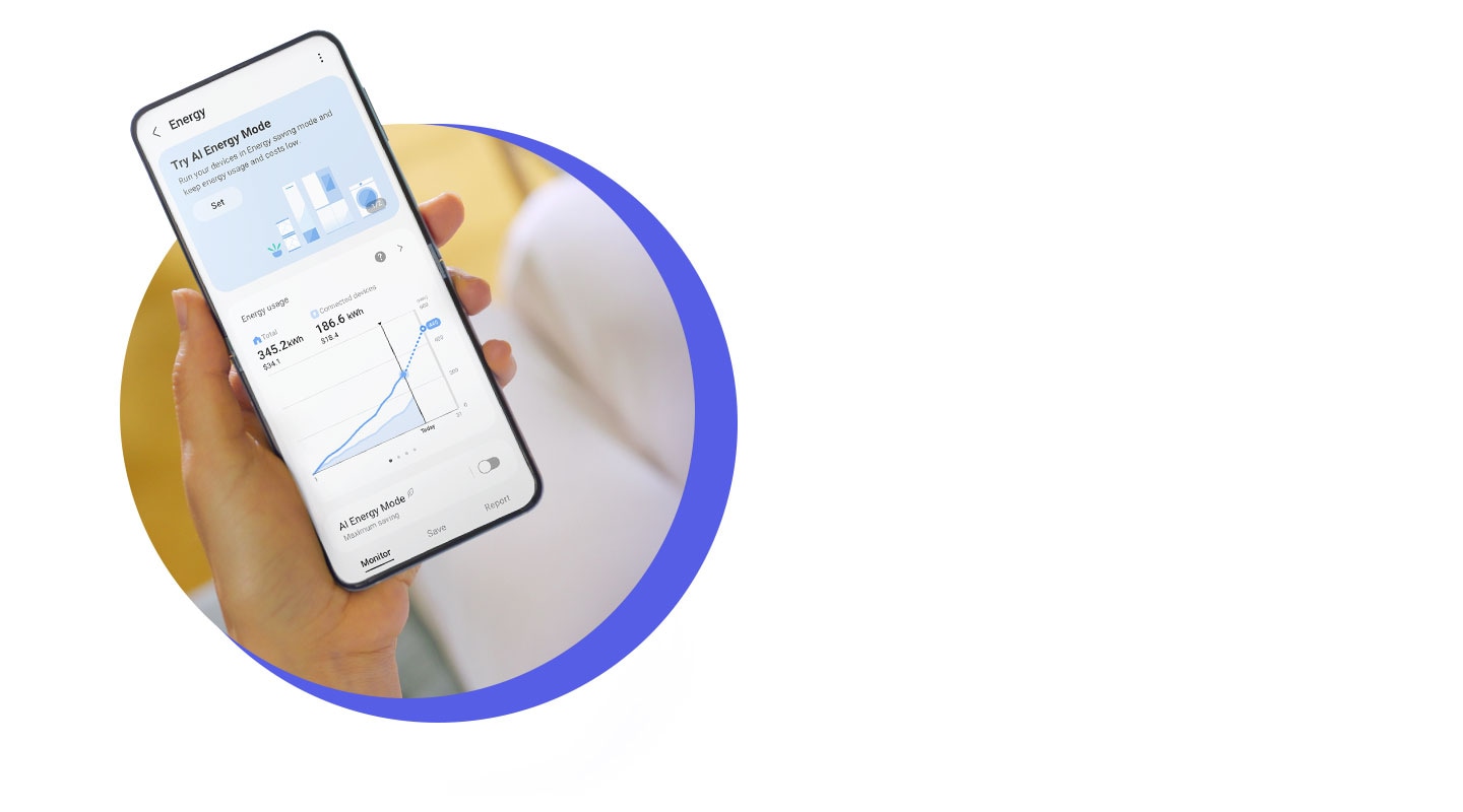 A hand holds a phone with the SmartThings app onscreen, showing a graph for energy usage.