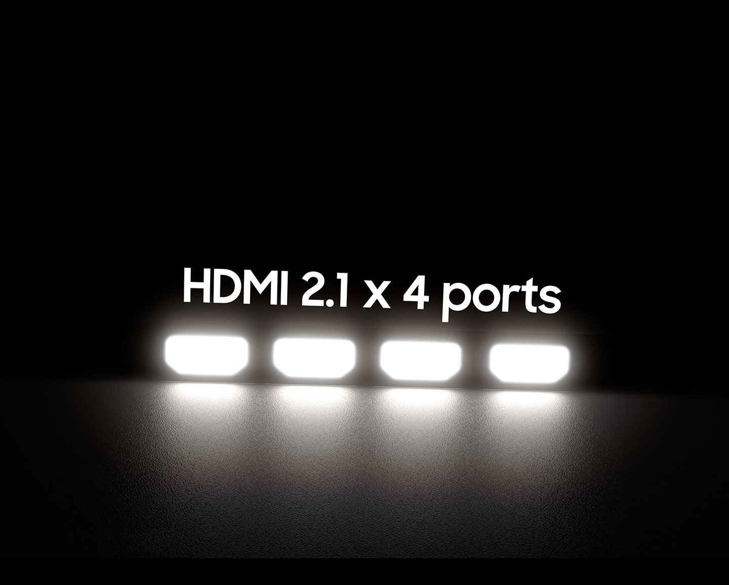 4 HDMI 2.1 cables fly into each of the 4 ports. Then 3 desktop PCs and one laptop are on display with a racing game playing in the background.