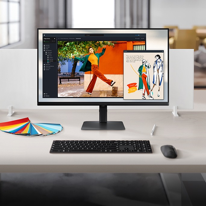 Monitor 4K UHD wyświetlający prace związane z projektowaniem mody.