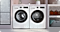 A washing machine and tumble dryer next to each other.