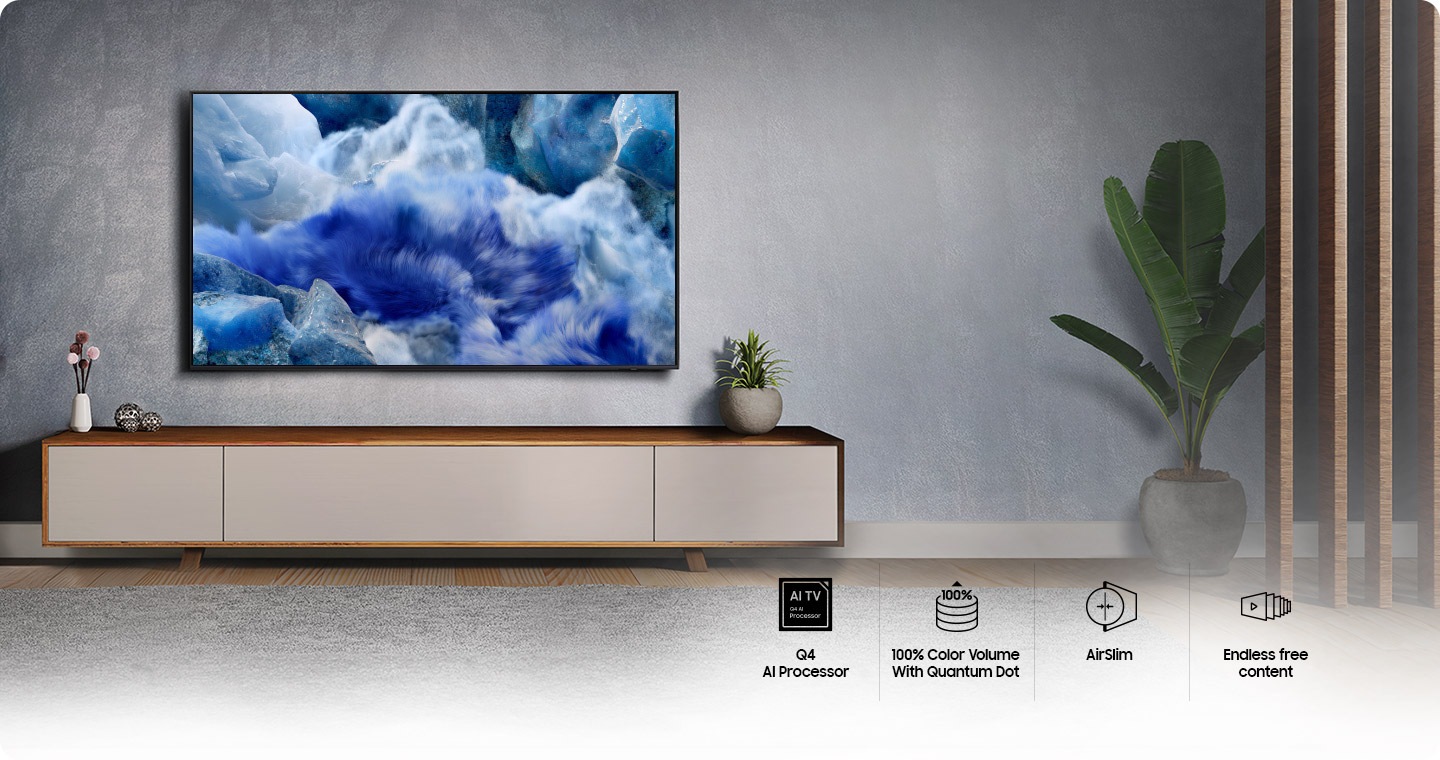 QLED screen mounted neatly onto the wall of a neutral-toned living room. Icons indicating the top features which are NQ4 AI Processor, 100% Color Volume With Quantum Dot, Airslim and Endless free content.
