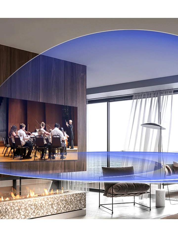 A 2020 QLED TV is playing musical content in a large, open-space living room. Two soundwave graphics illustrate how the AI sound of Samsung QLED TV delivers better sound quality in any room by analyzing the room dimensions through waves sent out by the TV.