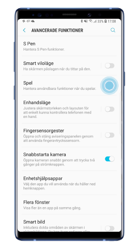 Tryck på Spel i menyn Avancerade funktioner