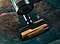 A Bespoke Jet™ AI with the Pet Tool+ cleans the sofa.