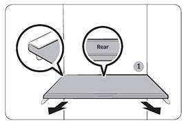 To remove a shelf, fully open the corresponding door. Hold the front of the shelf and gently lift up and slide out