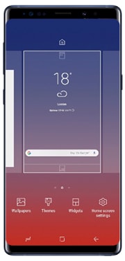 Tap and hold on the home screen and select Wallpapers