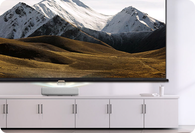 The Premiere, Samsung's advanced projector, displaying a scenic view in a modern living room setting