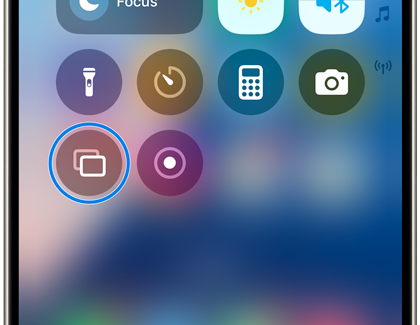 iOS device's Control Center displaying the Screen Mirroring icon, highlighted in blue, ready for selection.