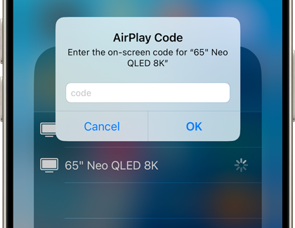 AirPlay Code prompt on an iOS device, requesting the on-screen code for selected device to proceed with screen mirroring.