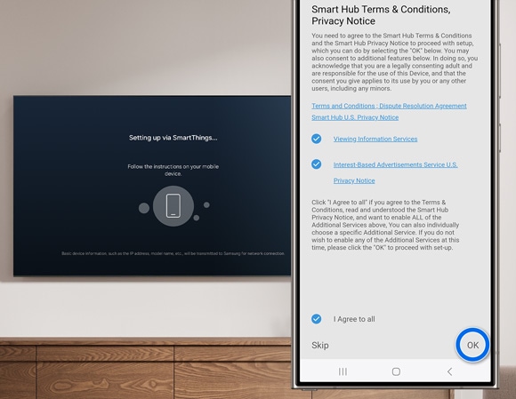 Phone screen in the foreground displaying 'OK' button with Smart Hub Terms & Conditions on a Samsung TV in the background.