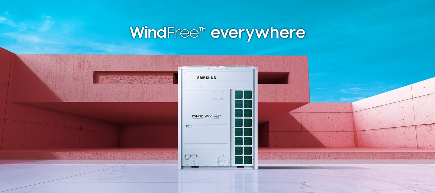 A white Samsung DVM S2 sits on a grey rooftop of the modern pink building. The words WindFree everywhere appear above.