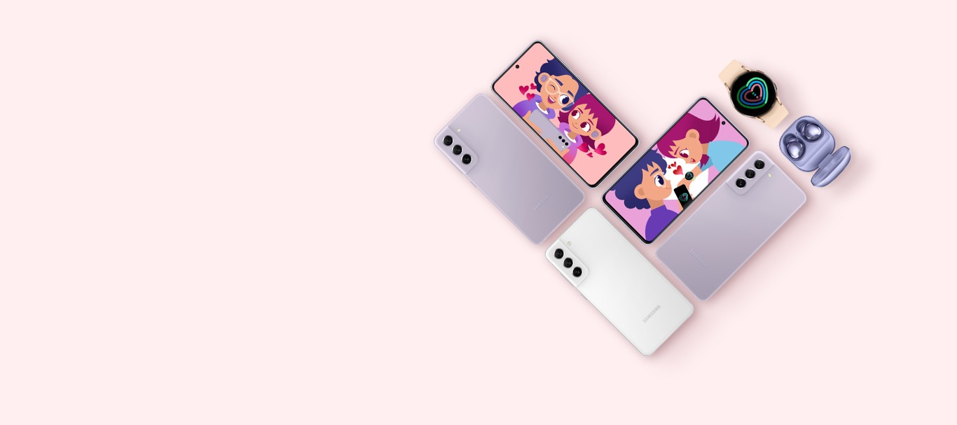 Flat lay of Galaxy devices displayed in heart shape. Devices include two Galaxy S21FE in Lavender and one Galaxy S21FE White is seen from the rear. And the other Galaxy S21FEs are displaying an illustration. Galaxy Buds2 in Phantom Violet with an open case, Galaxy Watch4 in Pink Gold.