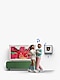 A stylish man and woman, appearing as a couple, are seen from the front holding hands and waltzing to music. Behind them, The Frame Pro is mounted on the wall, displaying a colorful screensaver. Below it, the Music Frame is placed, playing music, with several blue musical note icons floating between the characters and the products.