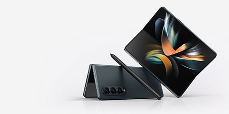 Two Galaxy Z Fold4 devices partially unfolded showcasing their look and the S Pen