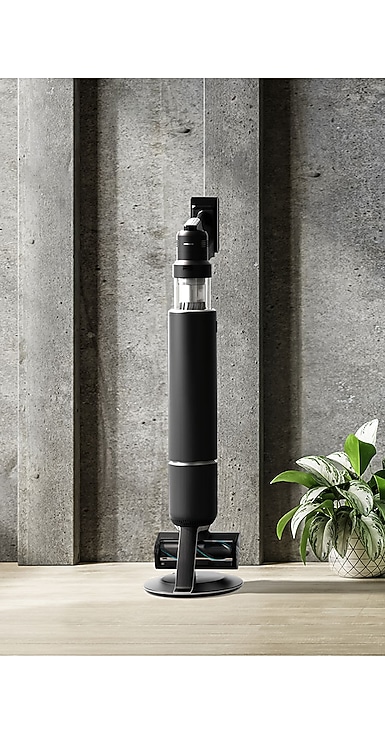 A Bespoke Jet™ AI model in Satin Black stands upright inside a chic room.