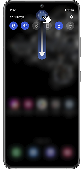 <b>Крок 1.</b> Проведіть двома пальцями вниз від верхньої частини екрана, щоб відкрити панель швидкого доступу (шторку)