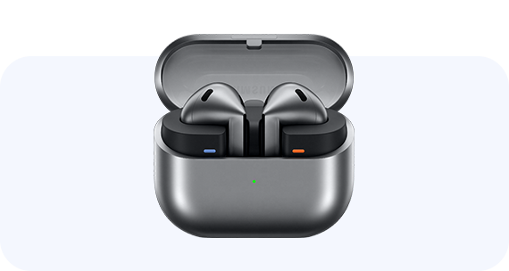 An open Galaxy Buds3 case in silver lies open showing off the buds.
