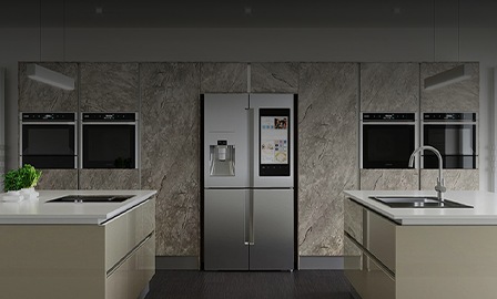 A Samsung fridge/freezer is shown in a kitchen setting with an island