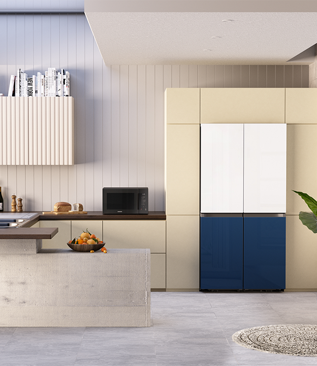 A Bespoke refrigerator with green, black, and white panels is in a kitchen with green walls and grey tiles. A Bespoke refrigerator with green, black, and white panels is in a kitchen with green walls and grey tiles.